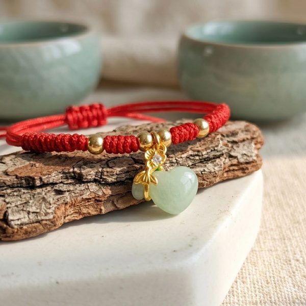 สร้อยข้อมือเชือกแดง ด้ายแดงมงคล + จี้หยกถุงทอง เสริมโชคลาภ เสริมด้านการเงิน ฮวงจุ้ย ปรับขนาดได้ สายมู